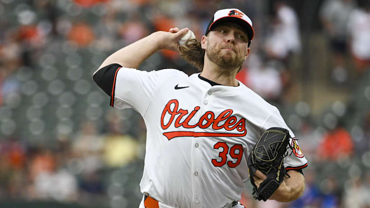 Jul 30, 2024; Baltimore, Maryland, USA;  Baltimore Orioles pitcher Corbin Burnes (39) delivers a first inning pitch against the Toronto Blue Jays at Oriole Park at Camden Yards.