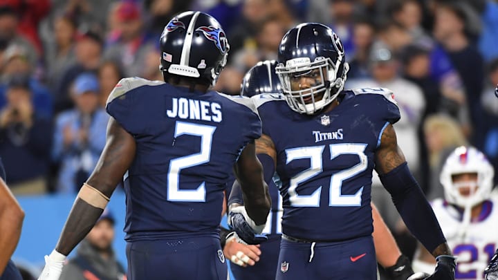 Oct 18, 2021; Nashville, Tennessee, USA; Tennessee Titans running back Derrick Henry (22) celebrates with wide receiver Julio Jones (2) after a touchdown during the second half against the Buffalo Bills at Nissan Stadium. Mandatory Credit: Christopher Hanewinckel-Imagn Images