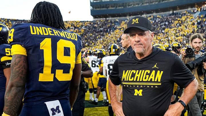 Michigan head coach Kyle Whittingham next to quarterback Bryce Underwood reacts to 20-19 loss to Iowa Michigan head coach Kyle Whittingham next to quarterback Bryce Underwood reacts to 20-19 loss to Iowa