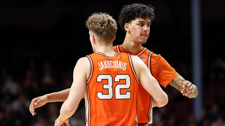 Feb 8, 2025; Minneapolis, Minnesota, USA; Illinois Fighting Illini forward Will Riley (7) and guard Kasparas Jakucionis (32) celebrate during the second half against the Minnesota Golden Gophers at Williams Arena. Mandatory Credit: Matt Krohn-Imagn Images