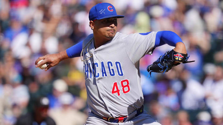 Aug 31, 2025; Denver, Colorado, USA; Chicago Cubs relief pitcher Daniel Palencia (48) delivers a pitch in the ninth inning against the Colorado Rockies at Coors Field. Mandatory Credit: Ron Chenoy-Imagn Images