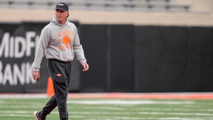 Head coach Mike Gundy walks on the field during an Oklahoma State spring football showcase at Boone Pickens Stadium in Stillwater, Okla., Saturday, April 19, 2025.