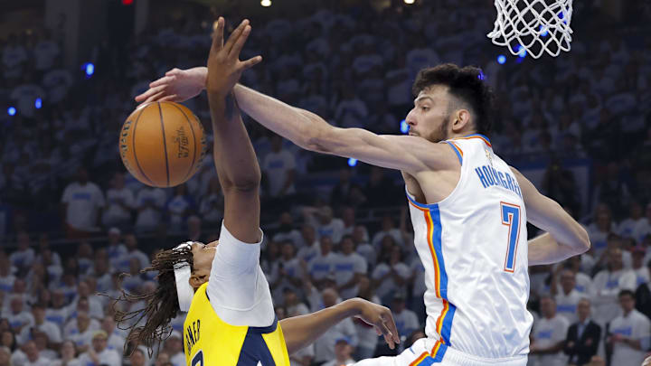 Jun 5, 2025; Oklahoma City, Oklahoma, USA; Oklahoma City Thunder forward Chet Holmgren (7) blocks a shot by Indiana Pacers center Myles Turner (33) during the first quarter in Game 1 of the 2025 NBA Finals at Paycom Center. Mandatory Credit: Alonzo Adams-Imagn Images Jun 5, 2025; Oklahoma City, Oklahoma, USA; Oklahoma City Thunder forward Chet Holmgren (7) blocks a shot by Indiana Pacers center Myles Turner (33) during the first quarter in Game 1 of the 2025 NBA Finals at Paycom Center. Mandatory Credit: Alonzo Adams-Imagn Images