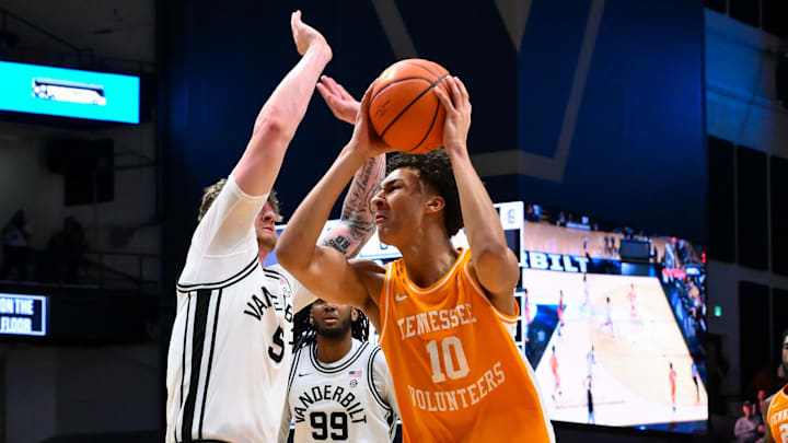 Feb 21, 2026; Nashville, Tennessee, USA;  Tennessee Volunteers forward Nate Ament (10) shoots the ball over Vanderbilt Commodores forward Tyler Nickel (5) during the first half at Memorial Gymnasium. Mandatory Credit: Steve Roberts-Imagn Images