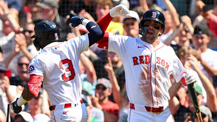 Jul 13, 2025; Boston, Massachusetts, USA; Boston Red Sox outfielder Ceddanne Rafaela (3) celebrates with third base Marcelo Mayer (39) after hitting a two-run home run against the Tampa Bay Rays during the sixth inning  at Fenway Park. Mandatory Credit: Brian Fluharty-Imagn Images