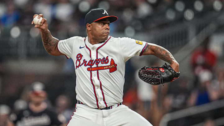 Sep 23, 2025; Cumberland, Georgia, USA; Atlanta Braves relief pitcher Raisel Iglesias (26)  pitches against the Washington Nationals during the ninth inning at Truist Park. Mandatory Credit: Dale Zanine-Imagn Images