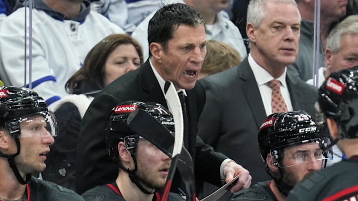 Carolina Hurricanes head coach Rod Brind'Amour talks to his players during a break in the action.