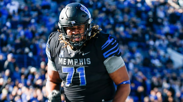 Memphis' Xavier Hill (71) celebrates after the team scored a touchdown during the game between Southern Methodist University and University of Memphis at Simmons Bank Liberty Stadium in Memphis, Tenn., on Saturday, November 18, 2023.