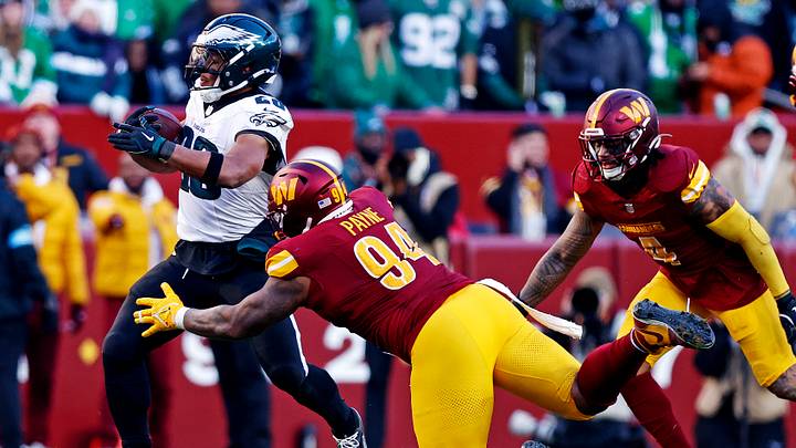 Dec 22, 2024; Landover, Maryland, USA; Philadelphia Eagles running back Saquon Barkley (26) runs the ball against Washington Commanders defensive tackle Daron Payne (94) during the third quarter at Northwest Stadium. Mandatory Credit: Peter Casey-Imagn Images Dec 22, 2024; Landover, Maryland, USA; Philadelphia Eagles running back Saquon Barkley (26) runs the ball against Washington Commanders defensive tackle Daron Payne (94) during the third quarter at Northwest Stadium. Mandatory Credit: Peter Casey-Imagn Images