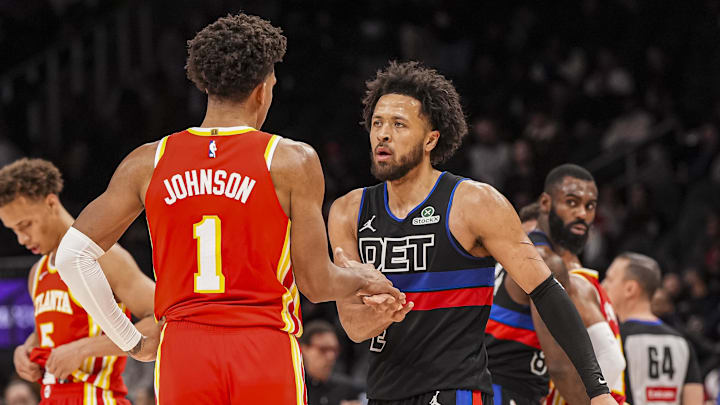 Jan 22, 2025; Atlanta, Georgia, USA; Detroit Pistons guard Cade Cunningham (2) and Atlanta Hawks forward Jalen Johnson (1) react after the Pistons defeated the Hawks at State Farm Arena. Mandatory Credit: Dale Zanine-Imagn Images Jan 22, 2025; Atlanta, Georgia, USA; Detroit Pistons guard Cade Cunningham (2) and Atlanta Hawks forward Jalen Johnson (1) react after the Pistons defeated the Hawks at State Farm Arena. Mandatory Credit: Dale Zanine-Imagn Images