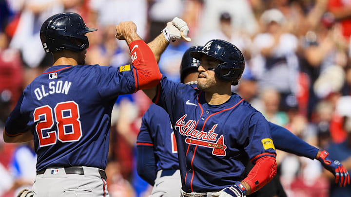 Atlanta Braves outfielder Ramon Laureano (18) reacts with first baseman Matt Olson.