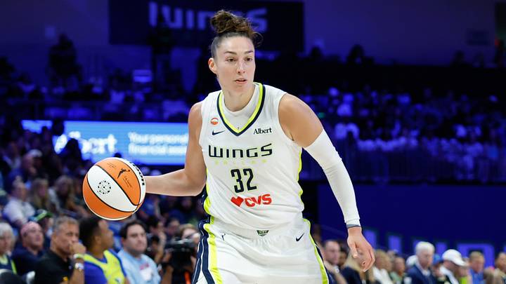 Aug 2, 2026; Arlington, Texas, USA;  Dallas Wings forward Jessica Shepard (32) controls the ball against the Connecticut Sun during the first half at College Park Center. Mandatory Credit: Chris Jones-Imagn Images