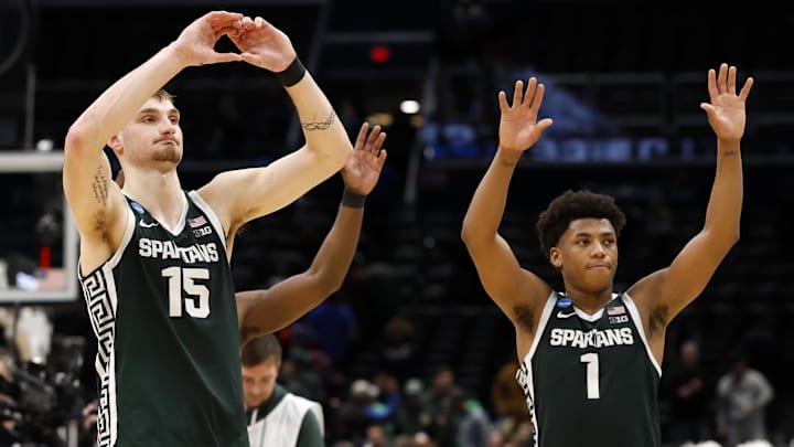 Mar 27, 2026; Washington, DC, USA; Michigan State Spartans center Carson Cooper (15) and guard Jeremy Fears Jr. (1) react after the game in a Sweet Sixteen game of the East Regional of the men's 2026 NCAA Tournament at Capital One Arena. Mandatory Credit: Geoff Burke-Imagn Images