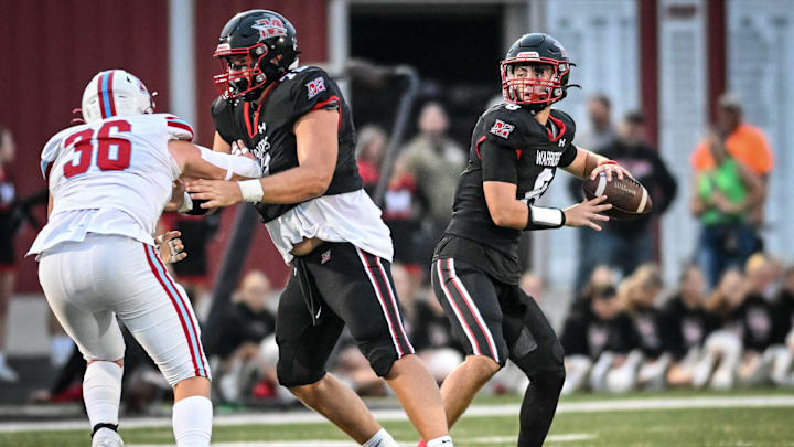 Muskego quarterback Joey Shaw (8) looks to pass against Arrowhead during a Classic 8 Conference game Friday, September 19, 2025, at Muskego High School in Muskego, Wisconsin.