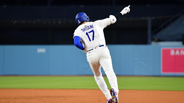 Apr 2, 2025; Los Angeles, California, USA; Los Angeles Dodgers designated hitter Shohei Ohtani (17) rounds the bases after hitting a walk off solo home run against the Atlanta Braves during the ninth inning at Dodger Stadium. Mandatory Credit: Gary A. Vasquez-Imagn Images