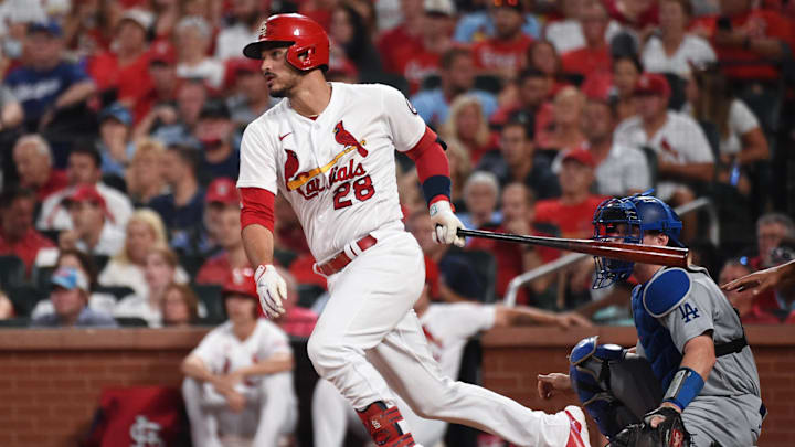 Sep 7, 2021; St. Louis, Missouri, USA; St. Louis Cardinals third baseman Nolan Arenado (28) watches his RBI single against the Los Angeles Dodgers during the third inning at Busch Stadium. Mandatory Credit: Joe Puetz-Imagn Images