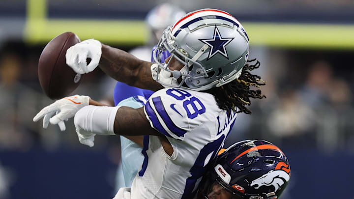 Oct 10, 2021; Arlington, Texas, USA; Dallas Cowboys receiver CeeDee Lamb (88) has a pass broken up in the third quarter by Denver Broncos cornerback Kye Fuller (23) at AT&T Stadium. Mandatory Credit: Matthew Emmons-USA TODAY Sports