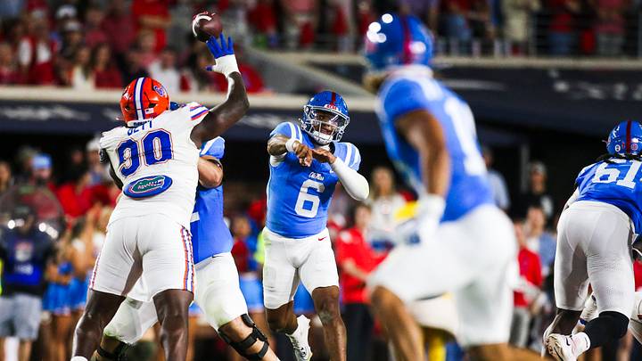 Mississippi Rebels quarterback Trinidad Chambliss passes against the Florida Gators during the second quarter at Vaught-Hemingway Stadium. Mandatory Credit: Petre Thomas-Imagn Images Mississippi Rebels quarterback Trinidad Chambliss passes against the Florida Gators during the second quarter at Vaught-Hemingway Stadium. Mandatory Credit: Petre Thomas-Imagn Images