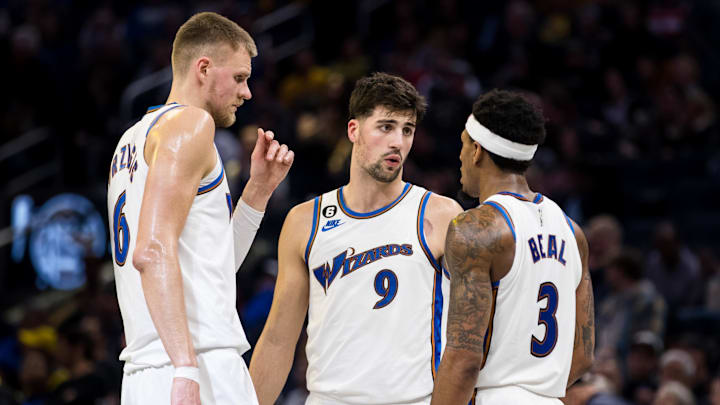 Feb 13, 2023; San Francisco, California, USA; Washington Wizards center Kristaps Porzingis (6) and forward Deni Avdija (9) and guard Bradley Beal (3) talk during the second half of the game against the Golden State Warriors at Chase Center. Mandatory Credit: John Hefti-Imagn Images