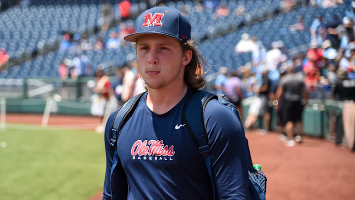 Jun 26, 2022; Omaha, NE, USA; Ole Miss Rebels starting pitcher Hunter Elliott (26) walks to the bullpen to warm up before the game against the Oklahoma Sooners at Charles Schwab Field. Mandatory Credit: Steven Branscombe-Imagn Images Jun 26, 2022; Omaha, NE, USA; Ole Miss Rebels starting pitcher Hunter Elliott (26) walks to the bullpen to warm up before the game against the Oklahoma Sooners at Charles Schwab Field. Mandatory Credit: Steven Branscombe-Imagn Images