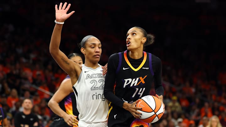 Oct 8, 2025; Phoenix, Arizona, USA; Las Vegas Aces center A'ja Wilson (22) against Phoenix Mercury forward DeWanna Bonner (14) during game three of the 2025 WNBA Finals at PHX Arena. Mandatory Credit: Mark J. Rebilas-Imagn Images Oct 8, 2025; Phoenix, Arizona, USA; Las Vegas Aces center A'ja Wilson (22) against Phoenix Mercury forward DeWanna Bonner (14) during game three of the 2025 WNBA Finals at PHX Arena. Mandatory Credit: Mark J. Rebilas-Imagn Images