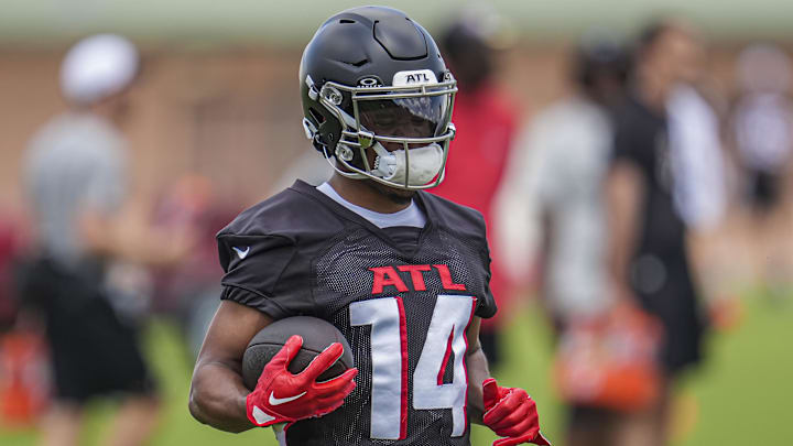 Jun 3, 2024; Atlanta, GA, USA; Atlanta Falcons wide receiver Rondale Moore (14) runs with the ball during Falcons OTA at the Falcons Training facility. 