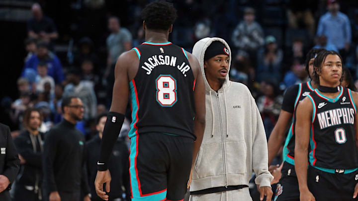 Jan 9, 2026; Memphis, Tennessee, USA; Memphis Grizzlies guard Ja Morant (right) reacts with Memphis Grizzlies forward/center Jaren Jackson Jr. (8) after the game against the Oklahoma City Thunder at FedExForum. Jan 9, 2026; Memphis, Tennessee, USA; Memphis Grizzlies guard Ja Morant (right) reacts with Memphis Grizzlies forward/center Jaren Jackson Jr. (8) after the game against the Oklahoma City Thunder at FedExForum.