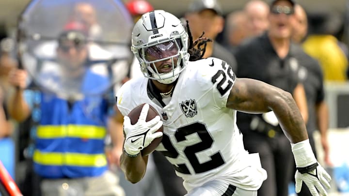 Sep 8, 2024; Inglewood, California, USA; Las Vegas Raiders running back Alexander Mattison (22) runs for a touchdown in the first half against the Los Angeles Chargers at SoFi Stadium. Mandatory Credit: Jayne Kamin-Oncea-Imagn Images