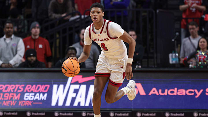 Feb 12, 2025; Piscataway, New Jersey, USA; Rutgers Scarlet Knights guard Ace Bailey (4) dribbles up court during the second half against the Iowa Hawkeyes at Jersey Mike's Arena. Mandatory Credit: Vincent Carchietta-Imagn Images