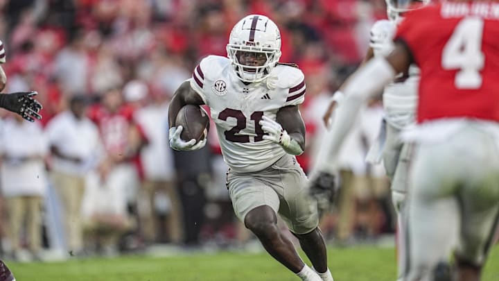 Oct 12, 2024; Athens, Georgia, USA; Mississippi State Bulldogs running back Davon Booth (21) runs the ball against the Georgia Bulldogs at Sanford Stadium. Mandatory Credit: Dale Zanine-Imagn Images