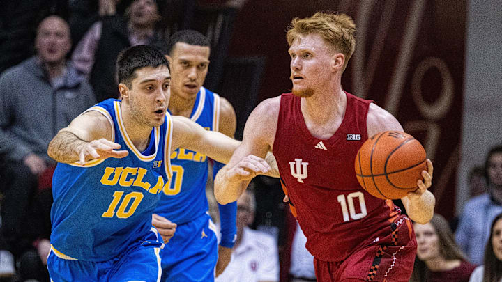 Indiana Hoosiers forward Luke Goode (10) dribbles the ball while UCLA Bruins guard Lazar Stefanovic (10) defends in the second half at Simon Skjodt Assembly Hall.