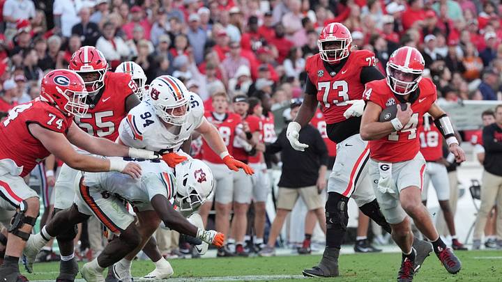 Oct 17, 2026; Athens, Georgia, USA;  Georgia quarterback Gunner Stockton (14) runs for a gain during the fourth quarter against Auburn at Sanford Stadium.  Mandatory Credit: Dale Zanine-Imagn Images