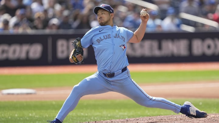 Jun 1, 2024; Toronto, Ontario, CAN;  Toronto Blue Jays starting pitcher Yusei Kikuchi (16) throws against the Pittsburgh Pirates during the fourth inning at Rogers Centre. Mandatory Credit: John E. Sokolowski-USA TODAY Sports