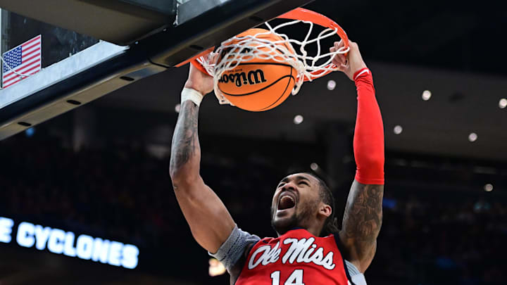 Mar 23, 2025; Milwaukee, WI, USA;  Mississippi Rebels guard Dre Davis (14) dunks against Iowa State Cyclones during the second half in the second round of the NCAA Tournament at Fiserv Forum. Mandatory Credit: Benny Sieu-Imagn Images