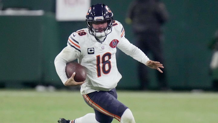 Chicago Bears quarterback Caleb Williams (18) runs for a first down during the third quarter of their game against the Green Bay Packers Sunday, December 7, 2025 at Lambeau Field in Green Bay, Wisconsin. Chicago Bears quarterback Caleb Williams (18) runs for a first down during the third quarter of their game against the Green Bay Packers Sunday, December 7, 2025 at Lambeau Field in Green Bay, Wisconsin.