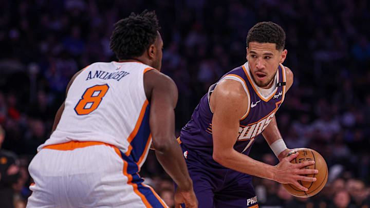 Apr 6, 2025; New York, New York, USA; Phoenix Suns guard Devin Booker (1) is guarded by New York Knicks forward OG Anunoby (8) during the first half at Madison Square Garden. Mandatory Credit: Vincent Carchietta-Imagn Images Apr 6, 2025; New York, New York, USA; Phoenix Suns guard Devin Booker (1) is guarded by New York Knicks forward OG Anunoby (8) during the first half at Madison Square Garden. Mandatory Credit: Vincent Carchietta-Imagn Images