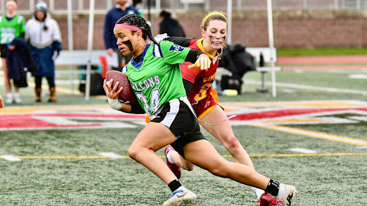 Kai Brinkley takes off for a touchdown as Woodinville held off Capital to win the 2025 Washington high school girls flag football title Saturday at Mount Tahoma.