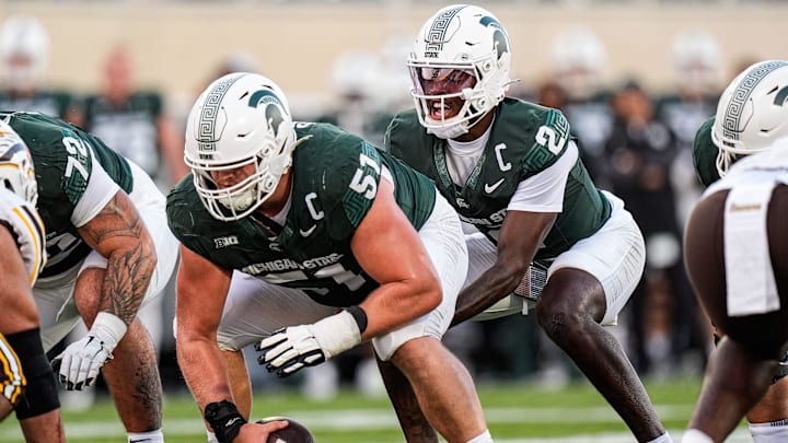 Michigan State quarterback Aidan Chiles (2) calls for a snap from offensive lineman Matt Gulbin (51) against Western Michigan during the first half at Spartan Stadium in East Lansing on Friday, August 29, 2025.