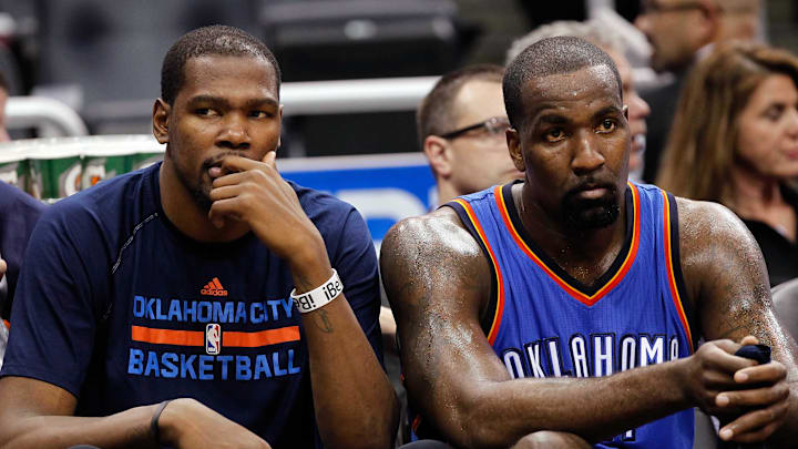 Jan 18, 2015; Orlando, FL, USA; Oklahoma City Thunder forward Kevin Durant (35) and center Kendrick Perkins (5) look on from the bench against the Orlando Magic during the second half at Amway Center. Oklahoma City Thunder defeated the Orlando Magic 127-99. Mandatory Credit: Kim Klement-Imagn Images