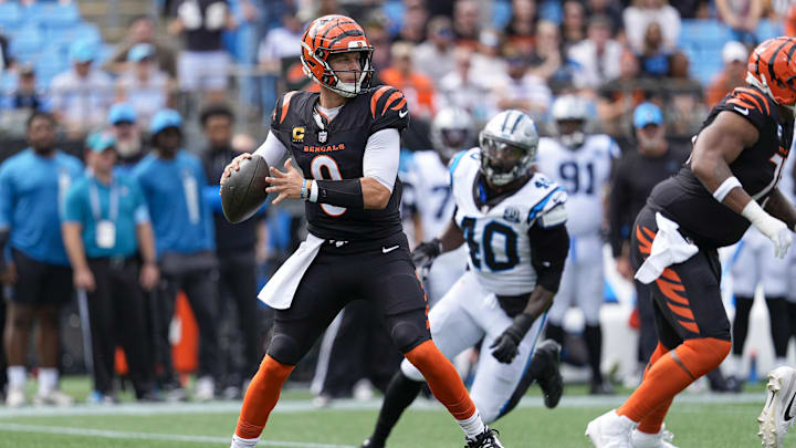 Sep 29, 2024; Charlotte, North Carolina, USA; Cincinnati Bengals quarterback Joe Burrow (9) makes a throw during 1st quarter against the Carolina Panthers at Bank of America Stadium. Mandatory Credit: Jim Dedmon-Imagn Images Sep 29, 2024; Charlotte, North Carolina, USA; Cincinnati Bengals quarterback Joe Burrow (9) makes a throw during 1st quarter against the Carolina Panthers at Bank of America Stadium. Mandatory Credit: Jim Dedmon-Imagn Images