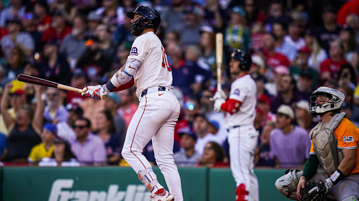 Sep 18, 2025; Boston, Massachusetts, USA; Boston Red Sox shortstop Trevor Story (10) hits a home run against the Athletics in the eighth inning at Fenway Park. Mandatory Credit: David Butler II-Imagn Images