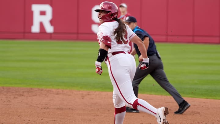 Isabela Emerling celebrates after hitting a grand slam against Arkansas at Love's Field on Friday in Norman, Okla.