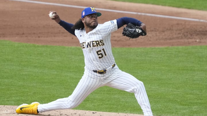 Jul 25, 2025; Milwaukee, Wisconsin, USA; Milwaukee Brewers pitcher Freddy Peralta (51) delivers a pitch against the Miami Marlins in the second inning at American Family Field. Mandatory Credit: Michael McLoone-Imagn Images