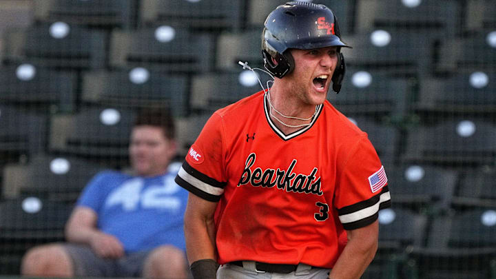 May 26, 2023; Mesa, AZ, USA; Sam Houston Bearkats' Walker Janek (3) celebrates his 3-run home run against the GCU Lobos during their WAC Tournament game at Hohokam Stadium.