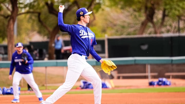 Feb 18, 2026; Glendale, AZ, USA; Los Angeles Dodgers pitcher Roki Sasaki (11) on the mound during Los Angeles Dodger workouts at Camelback Ranch in Glendale, Arizona. Mandatory Credit: Arianna Grainey-Imagn Images Feb 18, 2026; Glendale, AZ, USA; Los Angeles Dodgers pitcher Roki Sasaki (11) on the mound during Los Angeles Dodger workouts at Camelback Ranch in Glendale, Arizona. Mandatory Credit: Arianna Grainey-Imagn Images