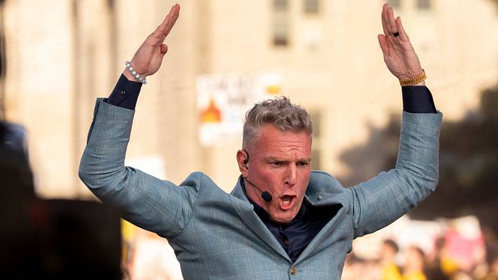 Pat McAfee joins Iowa fans in the I-O-W-A chant Oct. 3, 2026 during a live broadcast of ESPN’s “College GameDay” in downtown Iowa City, Iowa. Pat McAfee joins Iowa fans in the I-O-W-A chant Oct. 3, 2026 during a live broadcast of ESPN’s “College GameDay” in downtown Iowa City, Iowa.