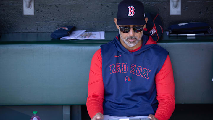 Jun 21, 2025; San Francisco, California, USA; Boston Red Sox manager Alex Cora sits in the dugout before his team takes on the San Francisco Giants at Oracle Park. Mandatory Credit: D. Ross Cameron-Imagn Images