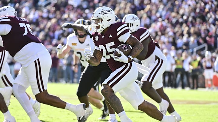 Nov 18, 2023; Starkville, Mississippi, USA; Mississippi State Bulldogs running back Jeffery Pittman (25) runs the ball against the Southern Miss Golden Eagles during the third quarter at Davis Wade Stadium at Scott Field. Mandatory Credit: Matt Bush-Imagn Images