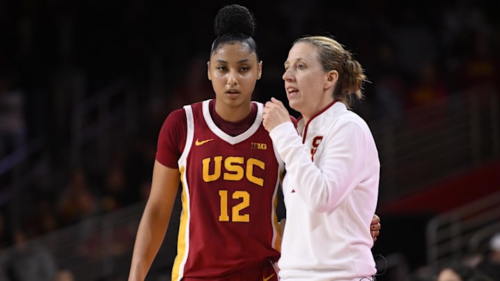 Feb 13, 2025; Los Angeles, California, USA; USC Trojans guard JuJu Watkins (12) and head coach Lindsay Gottlieb during the second half against the UCLA Bruins at Galen Center. Mandatory Credit: Robert Hanashiro-Imagn Images