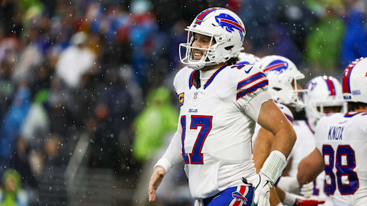 Oct 27, 2024; Seattle, Washington, USA; Buffalo Bills quarterback Josh Allen (17) celebrates after throwing a touchdown pass against the Seattle Seahawks during the second quarter at Lumen Field. Mandatory Credit: Joe Nicholson-Imagn Images